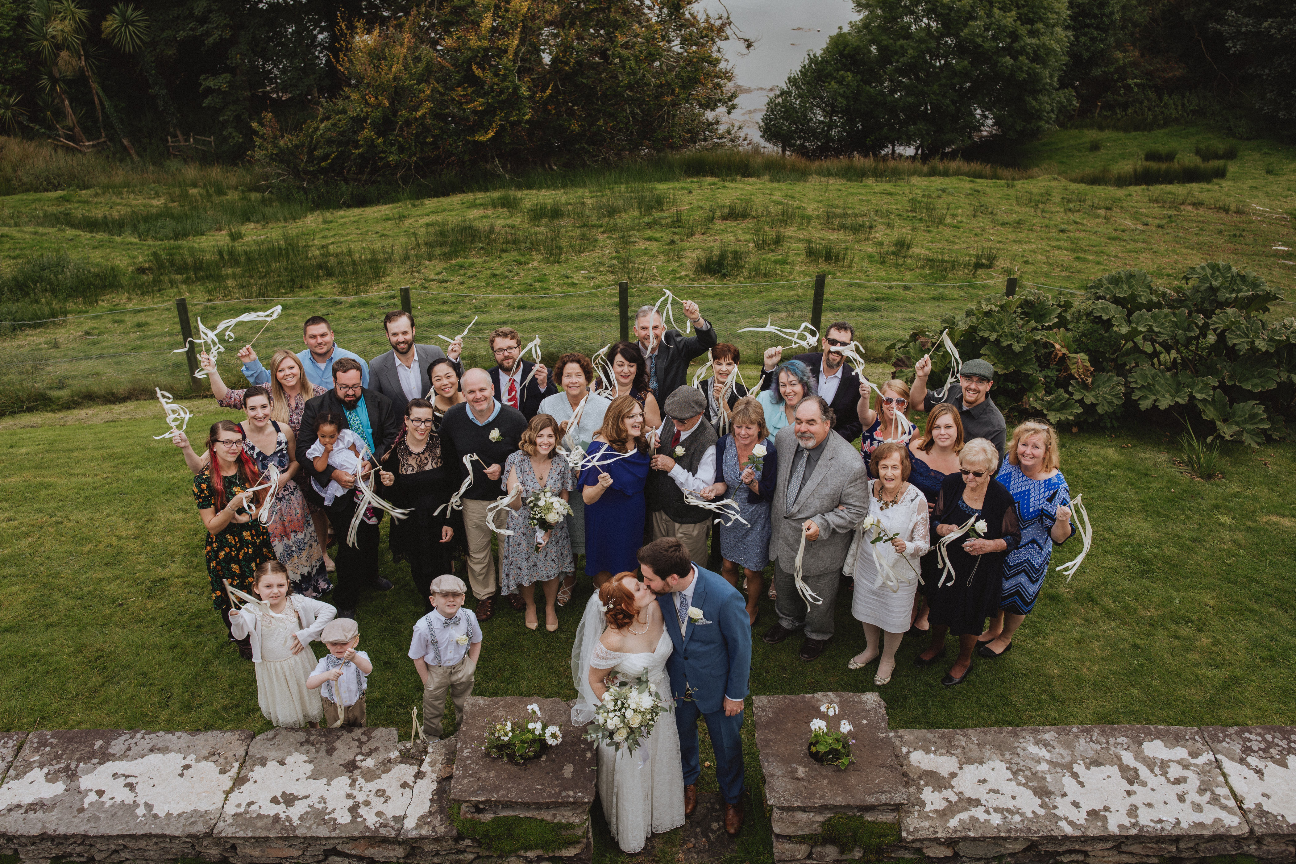 Friends and family cheer on the newlyweds. 